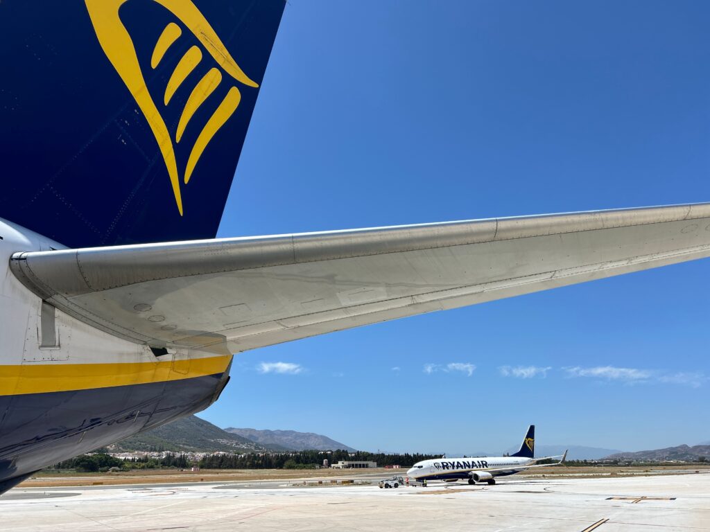 Ryanair airplane on the tarmac at a Spanish regional airport, highlighting reduced operations in 2025